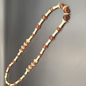 Amber color and ivory color necklace 31" long vtg